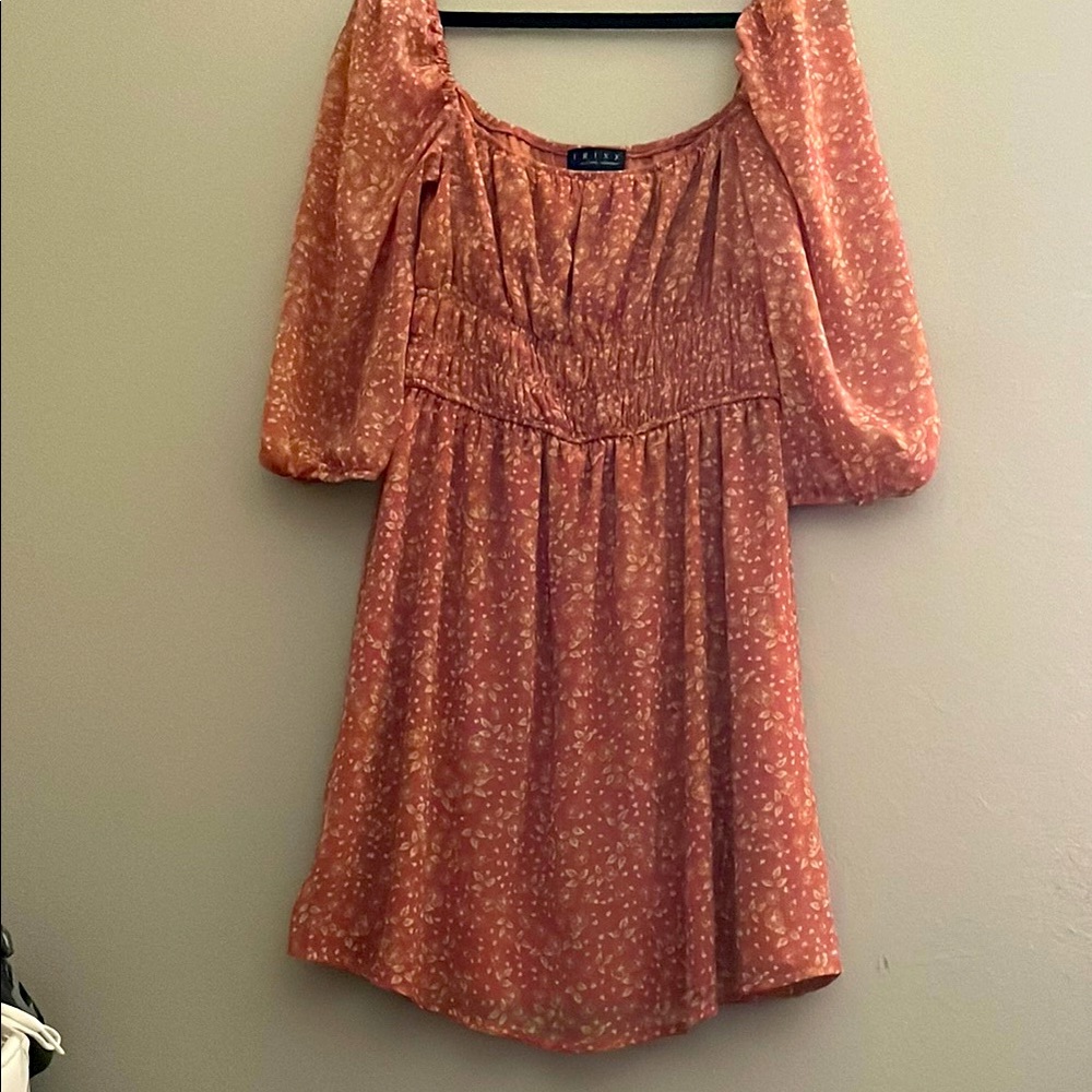 Sundress with flowers details from Trixx clothing company 
Size Small